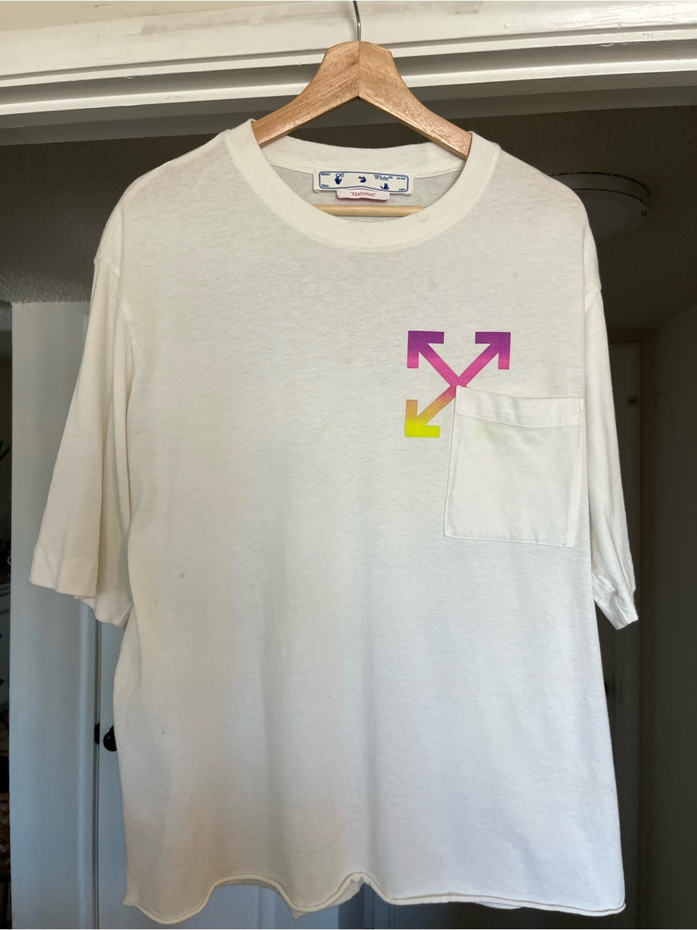 Off-White Short Sleeve Pocket Tee with Pink-to-Yellow Arrow Logo